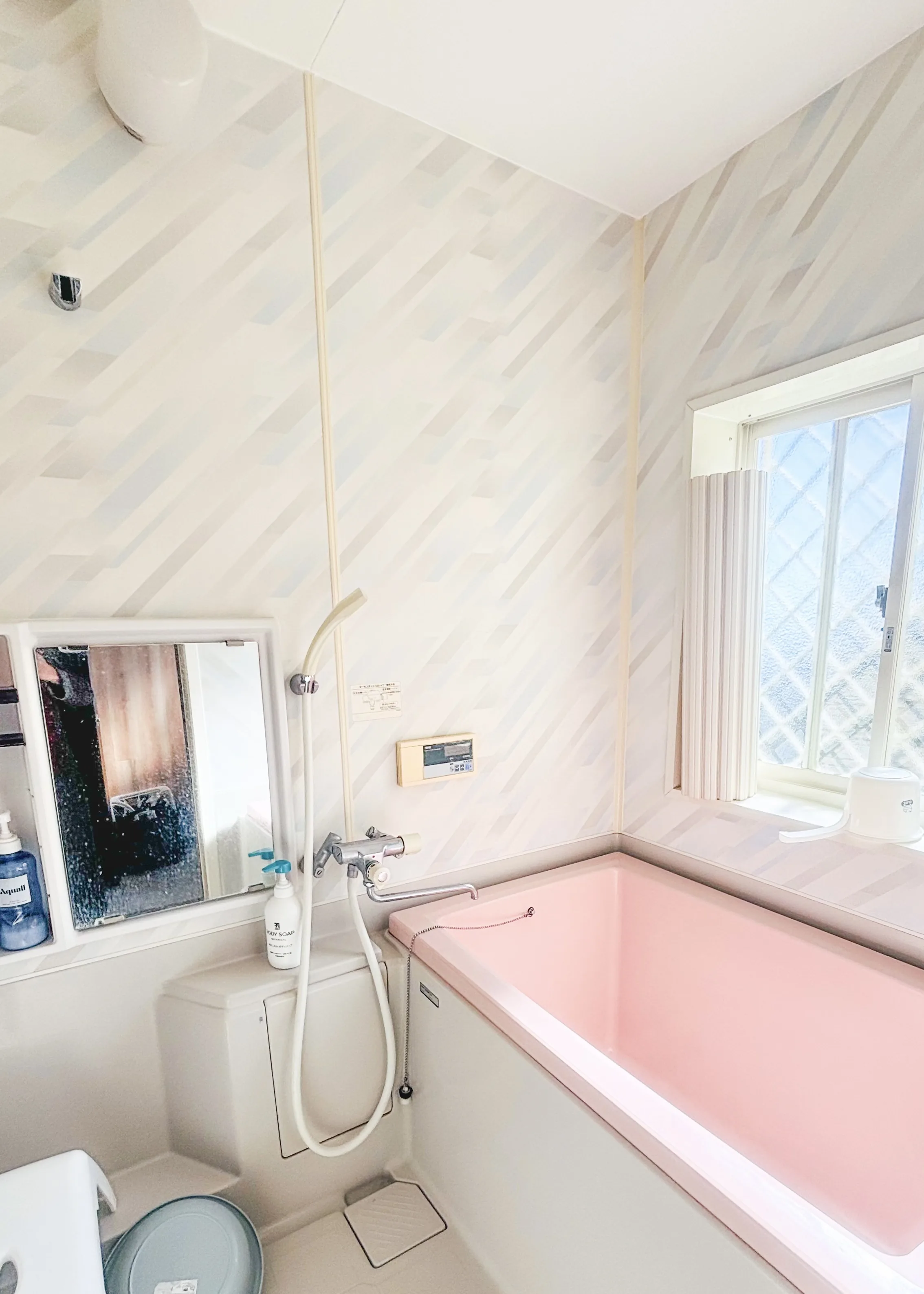 Japanese soaking tub bathroom — SORA Blue House beach house Japan