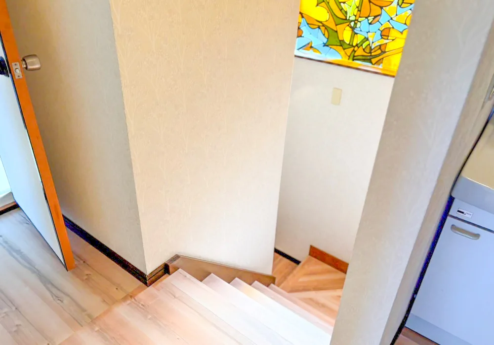 Staircase with stained glass — SORA Blue House interior Japan